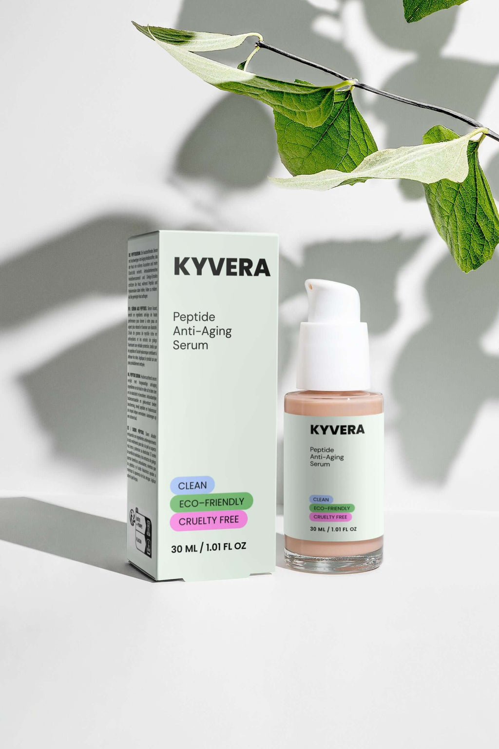 KYVERA Peptide Anti-Age Serum bottle and box on a minimalist background with green leaves.