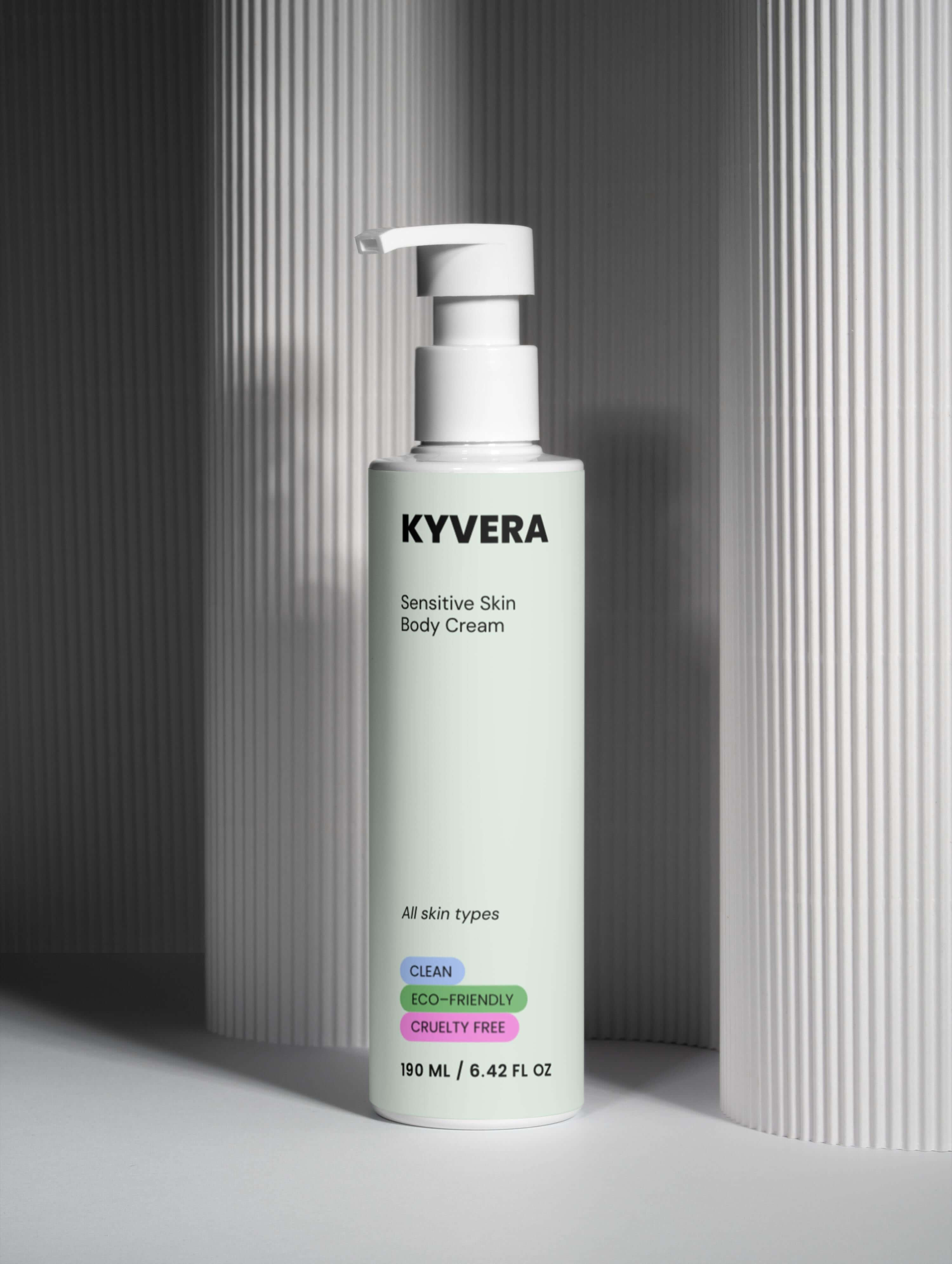 KYVERA Sensitive Skin Body Cream bottle placed against a textured backdrop showcasing its clean and eco-friendly attributes.