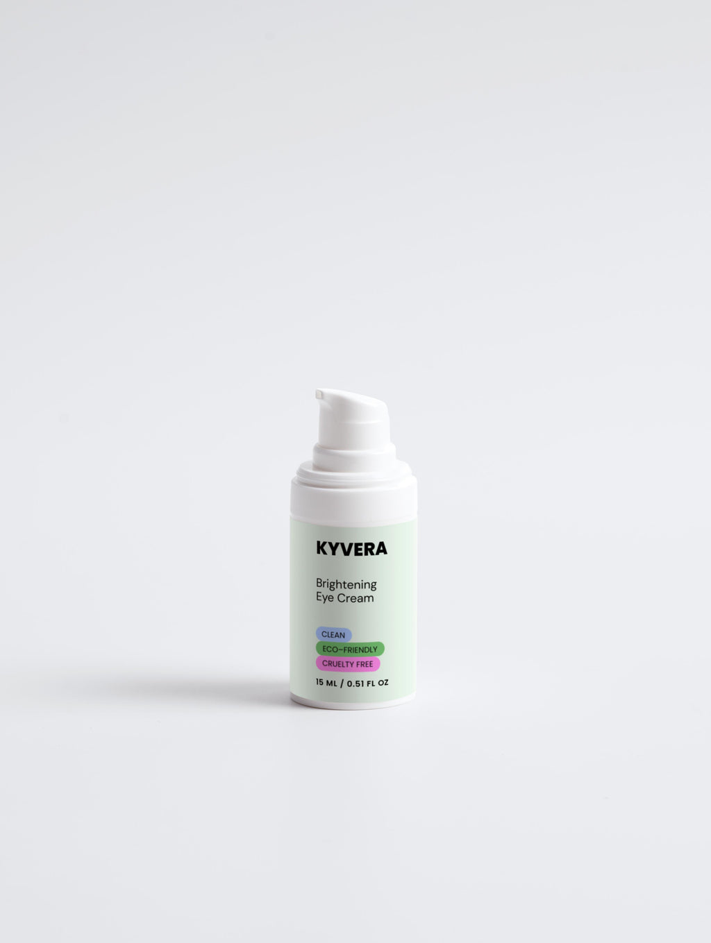 KVYVERA Brightening Eye Cream in a pump bottle for reducing dark circles and puffiness.