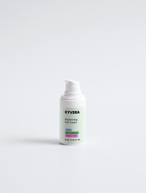 KVYVERA Brightening Eye Cream in a pump bottle for reducing dark circles and puffiness.