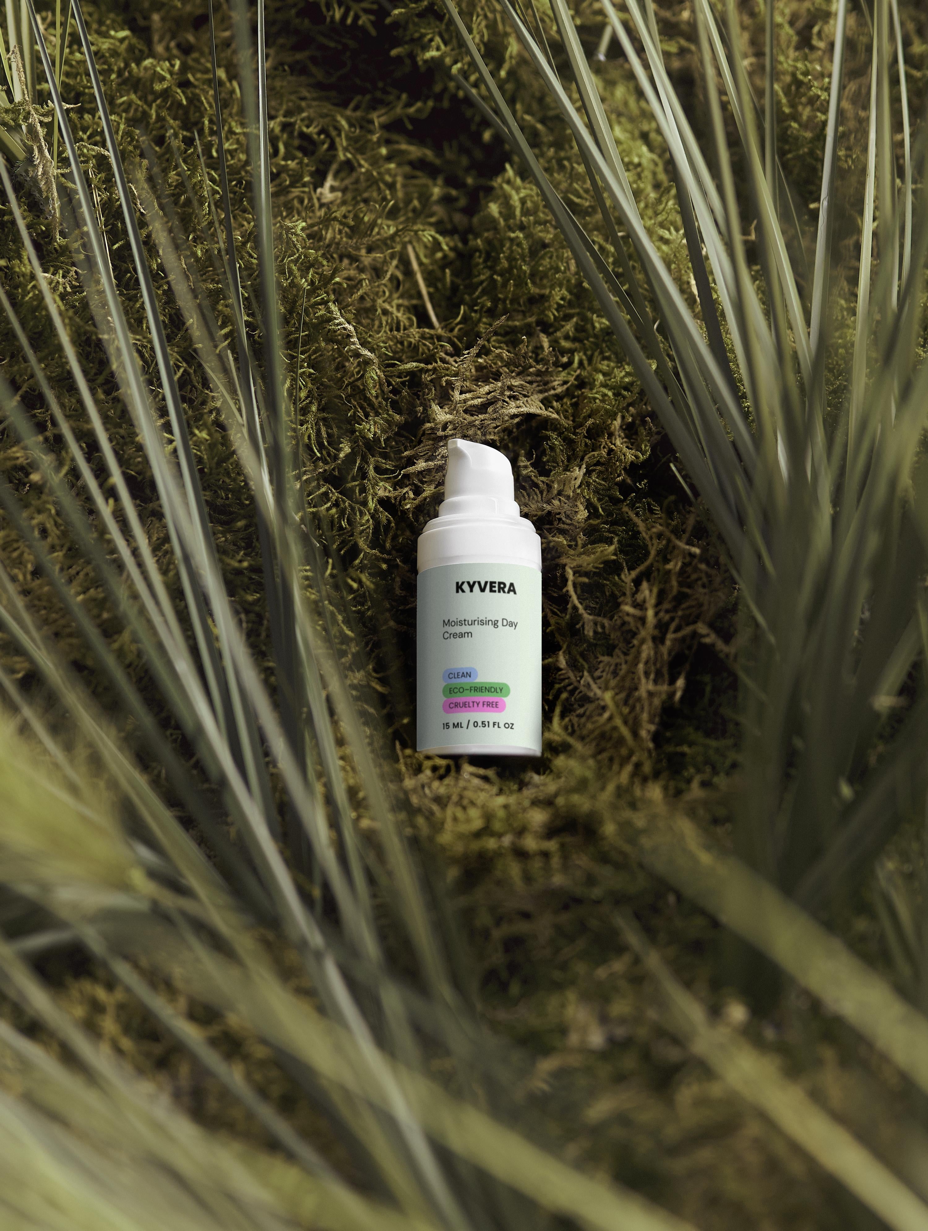 Moisturising Day Cream nestled among green moss, showcasing a hydrating skincare product for all-day moisture.