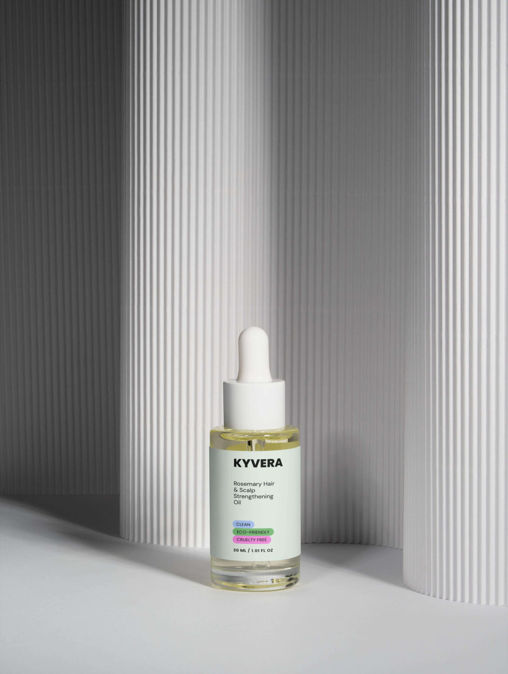 Rosemary Hair&Scalp Oil - Hydrating&Strengthening Hair Treatment in a dropper bottle on a minimalist background.