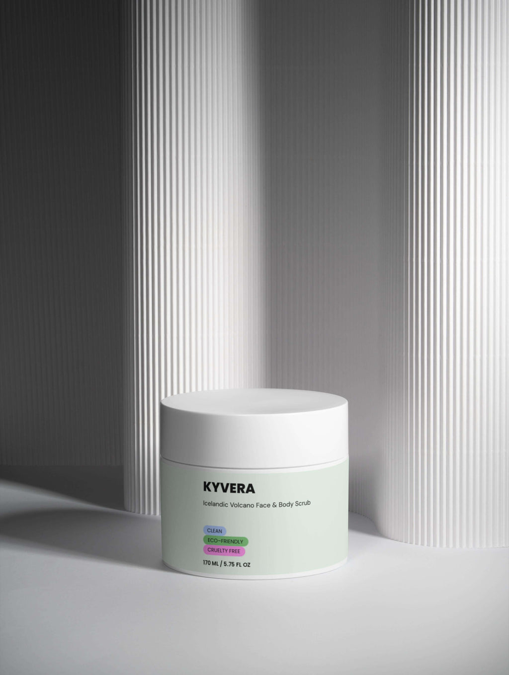 Icelandic Volcano Scrub product packaging on a minimalist surface, featuring its creamy exfoliating properties.